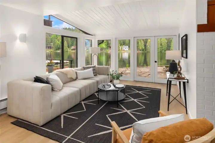Main living area open to the large lake side patio.