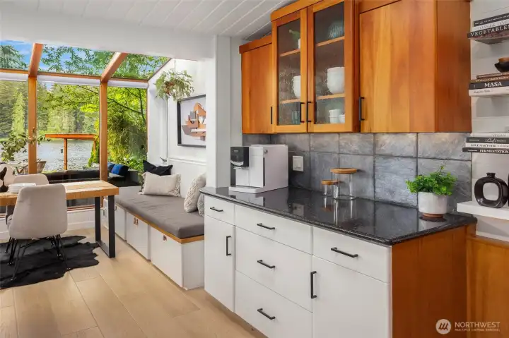Primary suite is a true retreat with lake views and two private decks