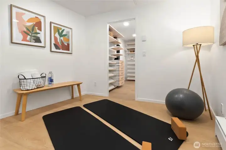 Main level flexible living space with its own kitchen, bath, bedroom, private entrance, and laundry—ideal for multigenerational living or guest quarters.