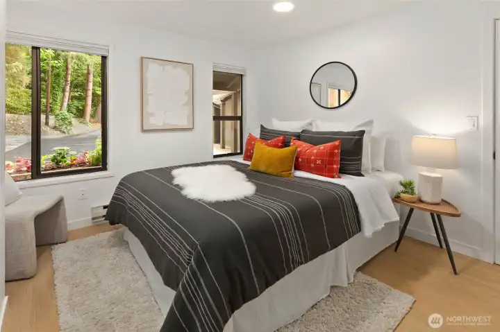 One of 2 main floor bedrooms.