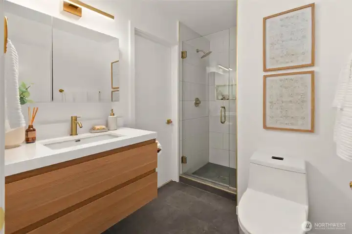 One of two updated main floor 3/4 bathrooms.