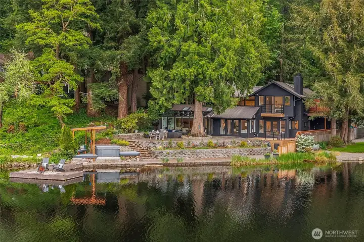 Paddleboard across glassy water, take a dip in the lake, or unwind in the hot tub as the lake reflects the changing sky.