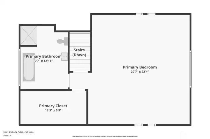 The upper-level primary suite offers exceptional privacy with a generous bedroom, walk-in closet, and luxurious ensuite bath designed for comfort and relaxation.