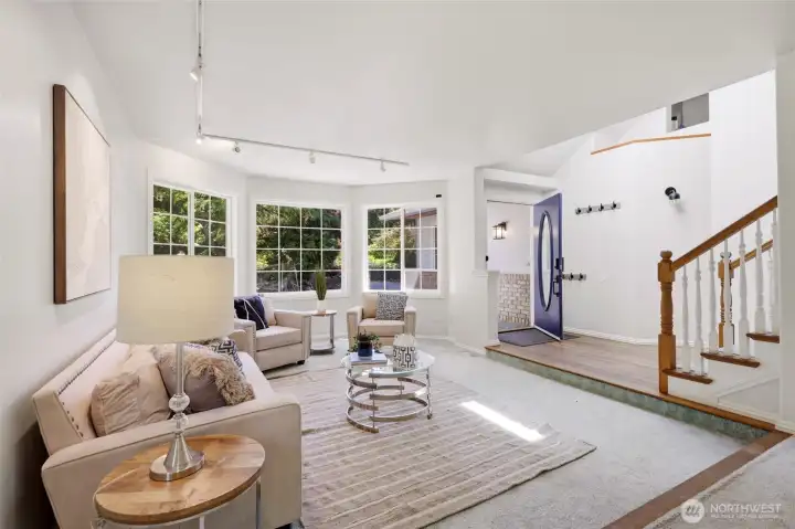 The bay windows in the front room provide wonderful natural light.