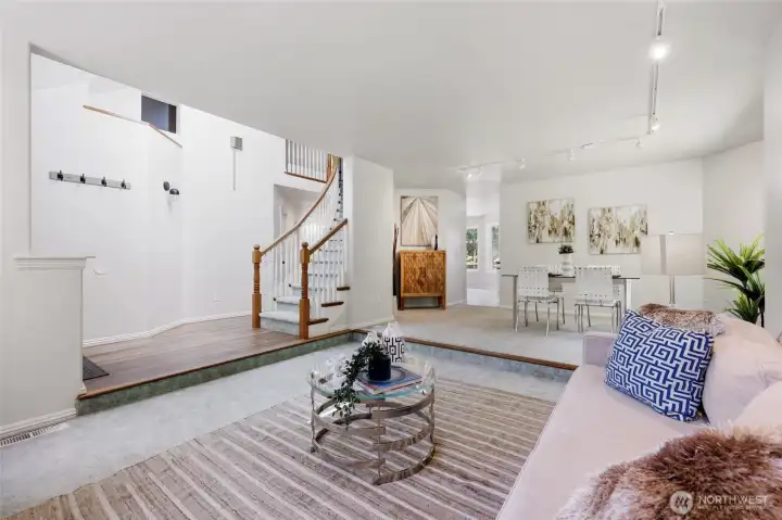 Gorgeous style in the living and dining rooms create a welcoming airy feel upon entry.