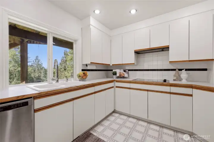 Speaking of dreams... the views from this kitchen window will have you lingering at the sink in peaceful satisfaction...