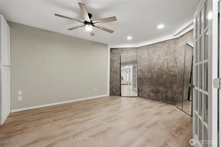 Favored as a workout or music room, a variety of options abound for this large room with ceiling fan and built-in storage!