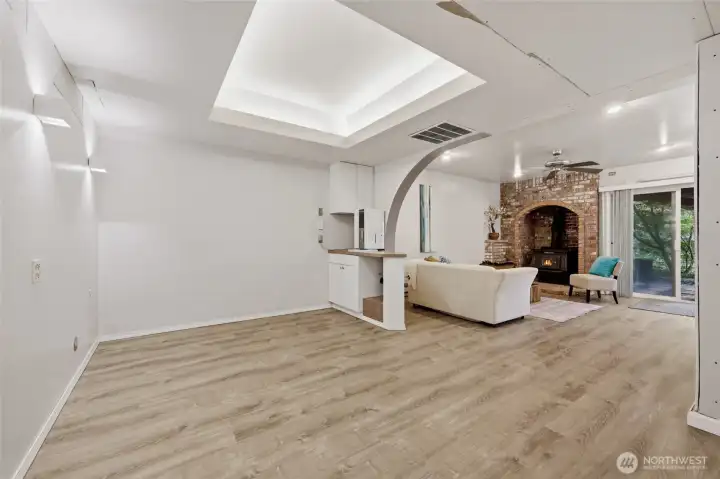 This light-filled room is an additional living space, as the basement provides an incredible separate living possibility.  Brand new luxury vinyl plank extends throughout the entirety of the basement; unfinished areas have drywall hung, with tape and mud being the final elements needed.