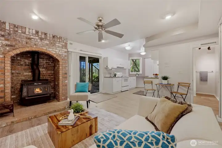 This angle allows you to view the main living area of this inviting space, complete with kitchen and 3/4 bath seen here, with bedroom beyond.