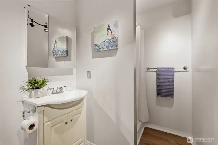 Fresh 3/4 bath on this level; perfect for these separate living quarters.