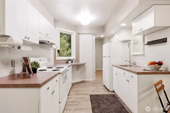 2nd full kitchen seen here, making this a wonderful option for multi-generational living, guest quarters, or a possible ADU!