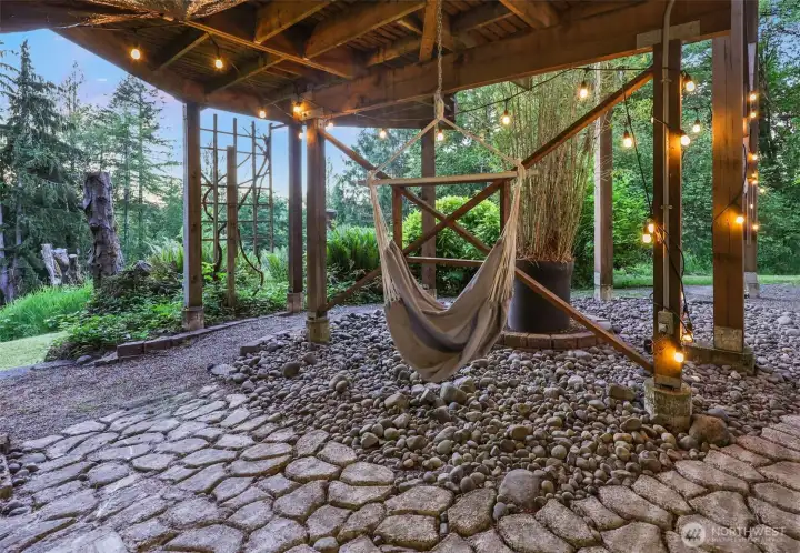 Just one view of the lovely paver patio area outside the basement slider...the pair of these hammock swings might just be the most peaceful spot on the property!