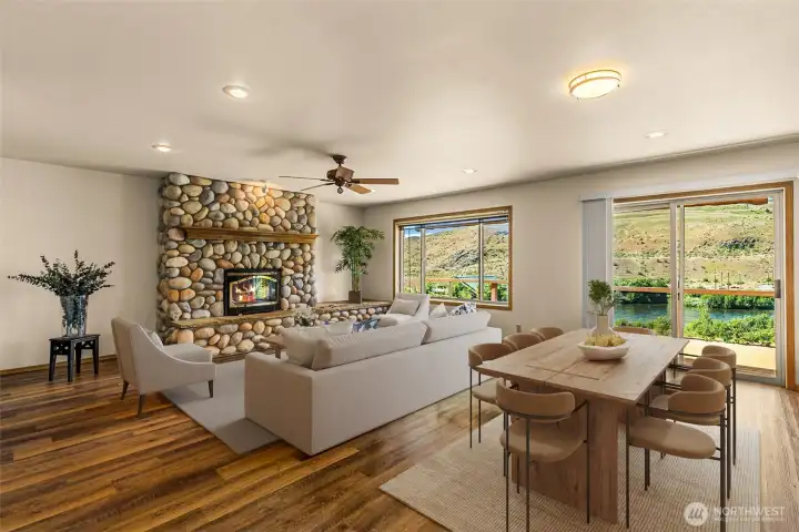 Step out of the study and into this expansive, sun-drenched living space! Looking southeast across the Methow River, this perspective truly captures the incredible amount of room and abundant natural light that make this home absolutely one-of-a-kind. It perfectly showcases the seamless flow between the living and dining areas. The photo is virtually staged.