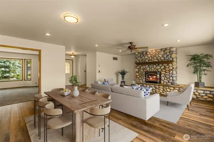 Looking NE at the entryway.  The entry welcomes you with warmth and comfort, instantly removing all stress. Photo virtually staged.