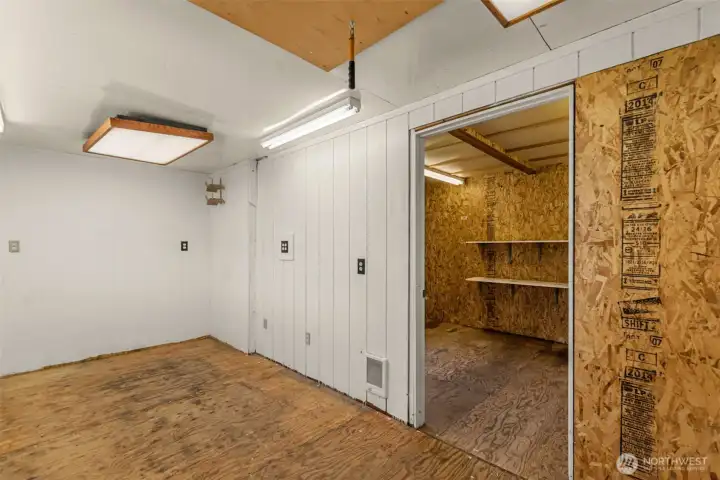 Welcome to the dream factory! This dedicated workspace is the ultimate environment for makers and creators. Whether you need an art studio, workshop, or crafting room, this space is yours to create. Storage area center top.