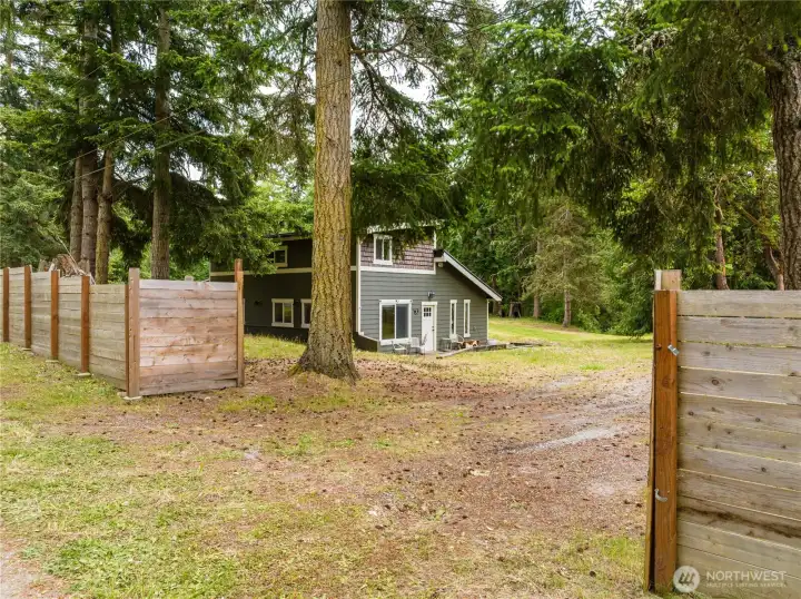 Second driveway entrance. Front door on this side