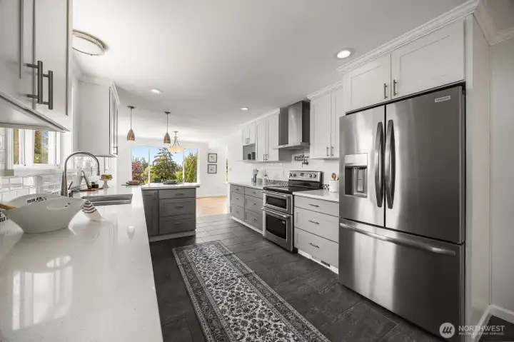 Fully remodeled in 2016. New dishwasher and refrigerator have just been installed along with a new garbage disposal. Look how nice it shines with all this cabinetry and slate floors. Fully remodeled in 2016. New dishwasher and refrigerator have just been installed along with a new garbage disposal. Look how nice it shines with all this cabinetry and slate floors.