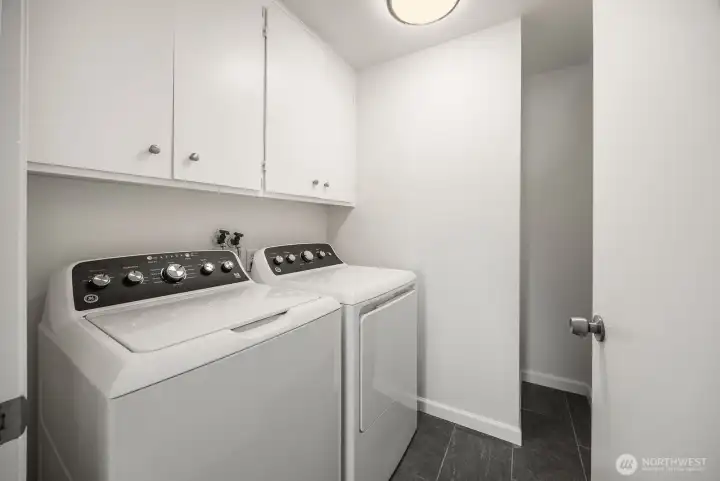 Laundry room with new washer & dryer. Laundry room with new washer & dryer.