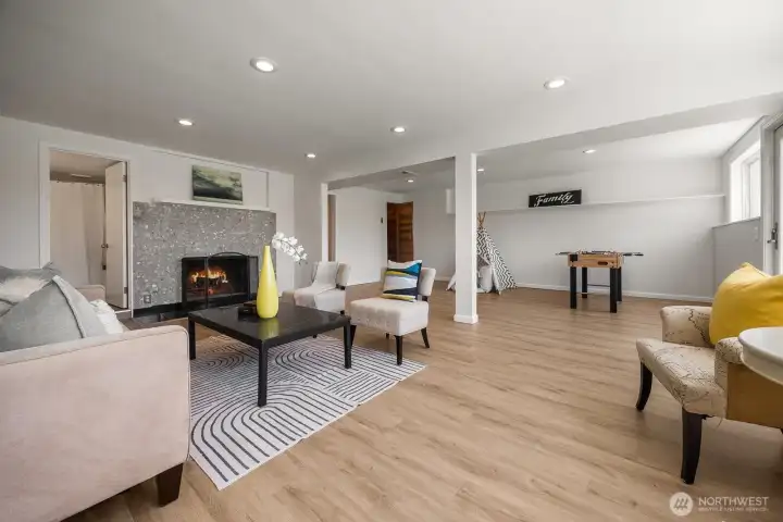 Lower level recreation room with full bath and wood burning fireplace that can be converted to gas. What a great space for an ADU with separate entrance. Lower level recreation room with full bath and wood burning fireplace that can be converted to gas. What a great space for an ADU with separate entrance.