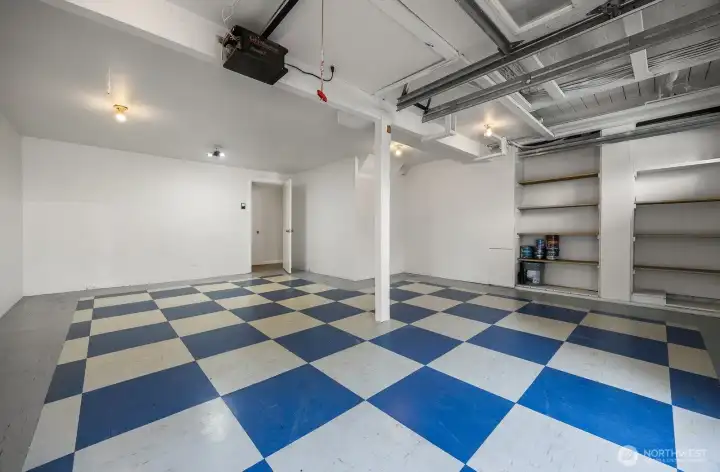 Attached two car garage with extra storage space. Attached two car garage with extra storage space.
