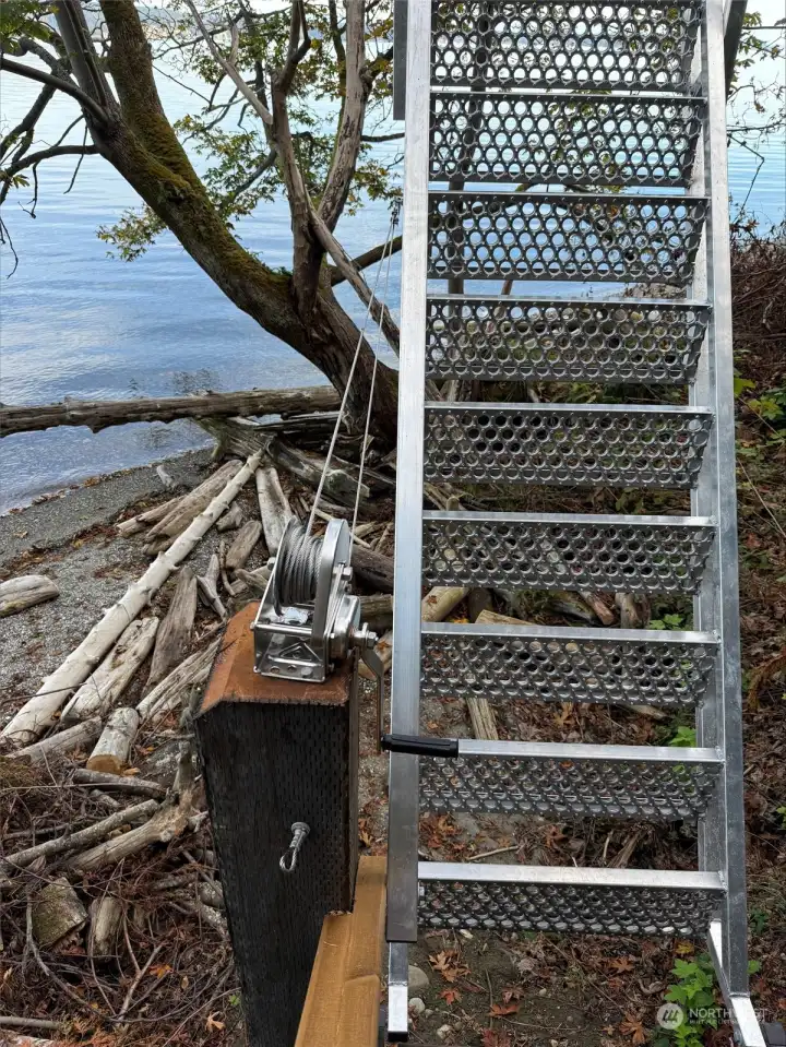 Sturdy metal stairs to the private beach