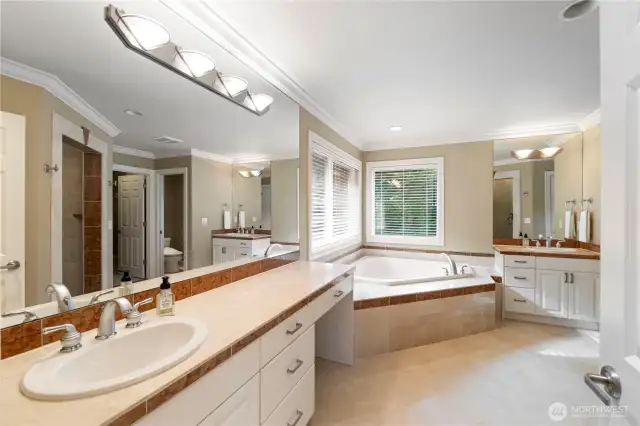 Primary Bathroom with marble counters and marble heated floors