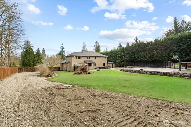 Get ready to enjoy a lush, new lawn this summer! The backyard has been freshly seeded and is currently growing into a beautiful green space.