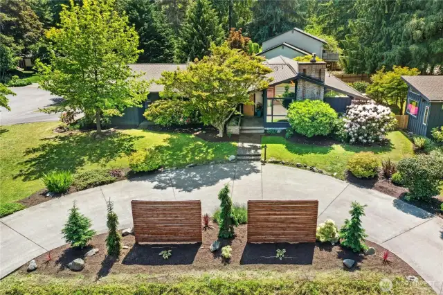 This fun Mid-Modern home enjoys all day sun from atop the hill in the Koura Farms area of Meadowmeer.