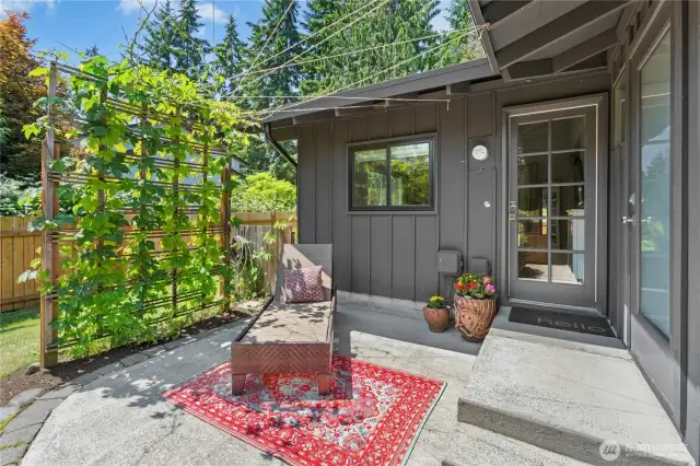 The sunny and private side yard can be conveniently accessed from the primary bathroom and the family room.