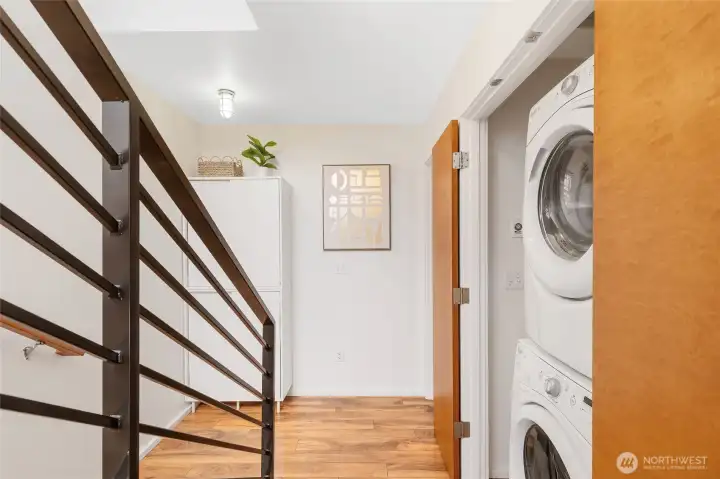 Convenient stacked washer and dryer located between both bedrooms—making laundry day simple and efficient.