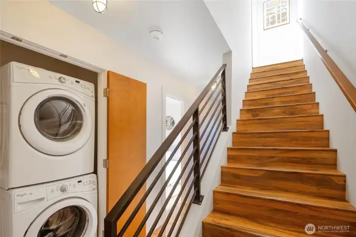 Another view of the washer and dryer near the bedrooms—then it’s time to head upstairs to the rooftop deck for some fresh air and relaxation.