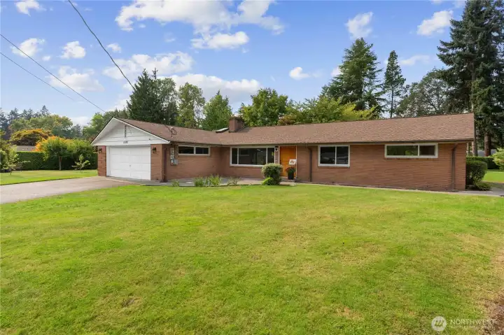 This beautiful classic brick rambler is situated on a .55-acre lot, in the popular Lakewood area. Close to everything you need - shops, restaurants and entertainment. A great place to call home!