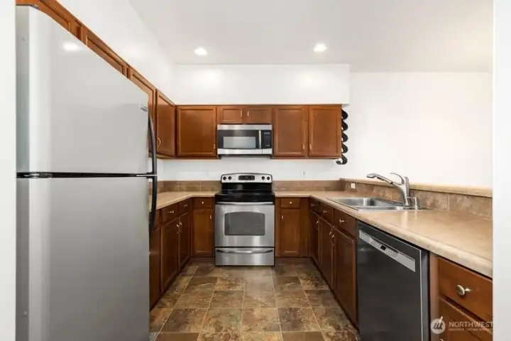 Functional kitchen with tons of storage.