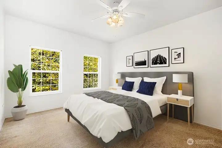 Primary bedroom also looks out onto the greenbelt.
