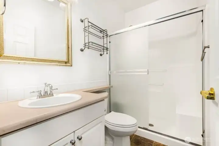 Second bathroom acts as primary bedroom en suite!