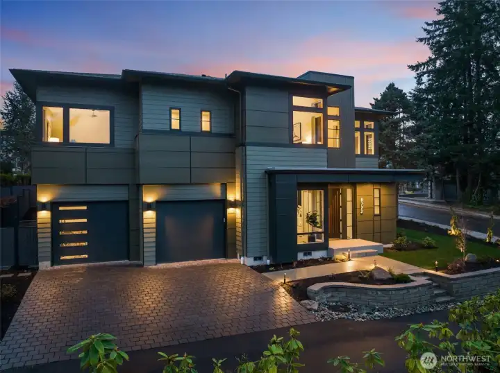 Stunning Corner-Lot Modern w/ Enhanced Lighting & Oversized 3-Car Tandem Garage.