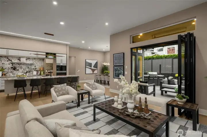 Nano Doors Opens to Covered Patio, BBQ Station & Infrared Heat for Year-Round Living.