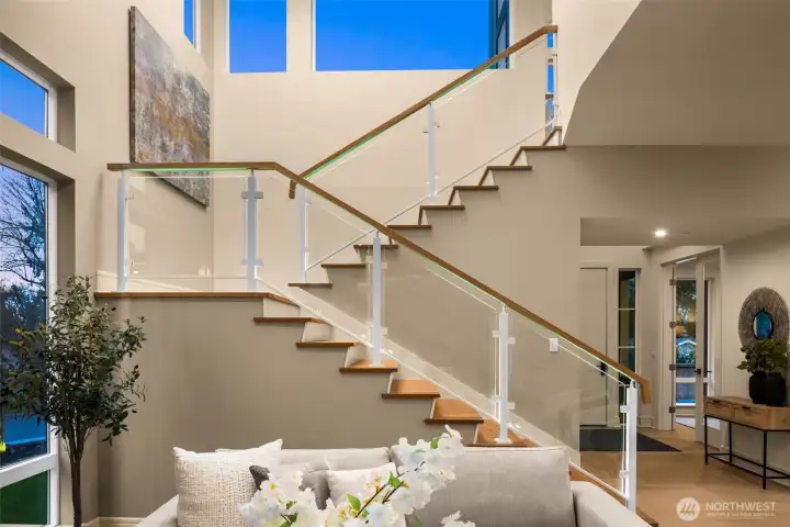 Sculptural Glass Stairway w/ Motion Activated Toe-Kick Lighting, Fully Customizable.