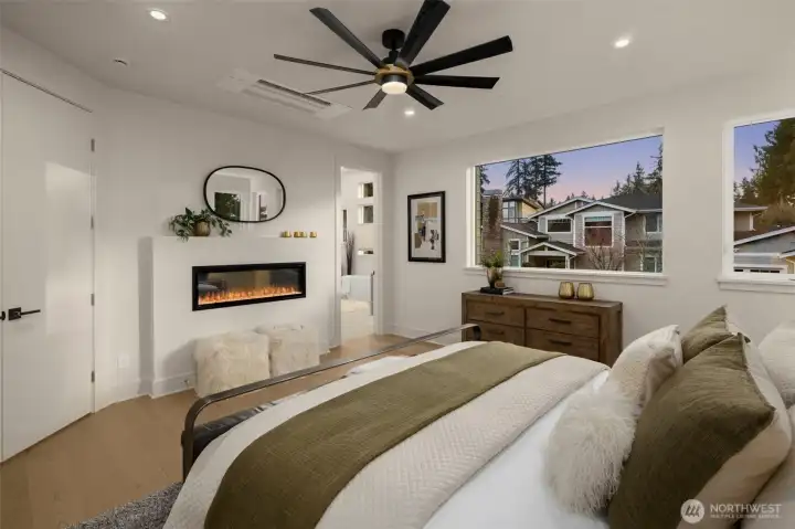 Warmth, Comfort, and Control w/ Linear Fireplace, overhead fan & recessed mini-split for effortless everyday living.