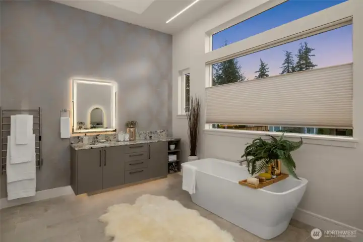 Escape to a Resort-Style Primary Bath w/ Dual Vanities, Deep Soaking Tub, Heated Floors, & Towel Warmer.