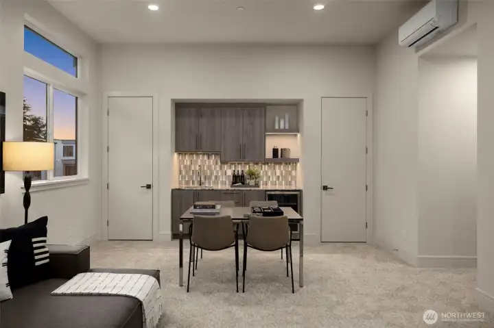 Media Room Includes Full Wet Bar, Beverage Cooler, Sink & Storage for Seamless Hosting.