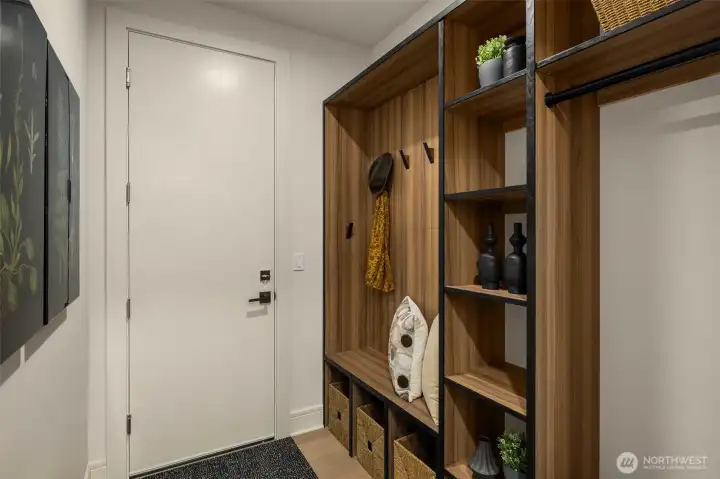 Garage-Entry Drop Zone w/ Custom Built-Ins & Warm Wood Organization.