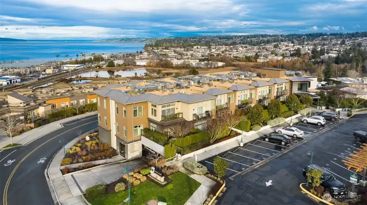 An aerial view of 50 Pine in Edmonds, perched above the bluff with beautiful west-facing views of Puget Sound, the marina, and ferries passing by—capturing the serene coastal beauty of Edmonds living.