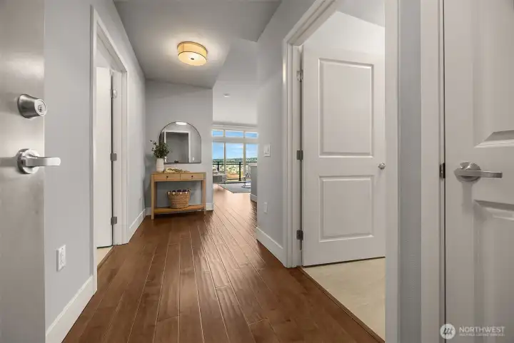 A bright, welcoming entry hall that sets the tone for the condo, featuring clean lines, warm finishes, and an inviting first impression as you step inside.