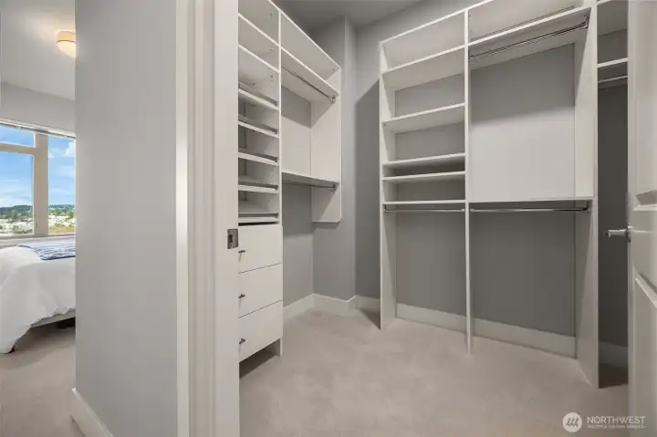A dream closet with abundant storage, custom shelving and plenty of space to organize your wardrobe effortlessly.