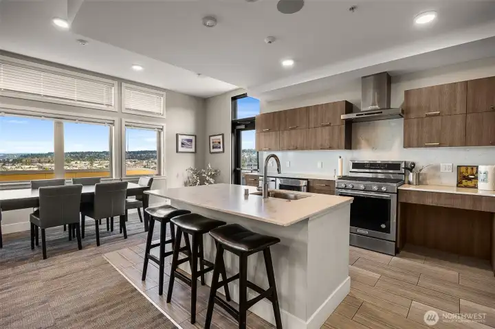 Spacious clubhouse with a full kitchen, ideal for gatherings, events, or entertaining guests in style.