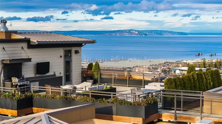 Expansive terrace offering stunning panoramic views, perfect for relaxing or entertaining while taking in the scenery.