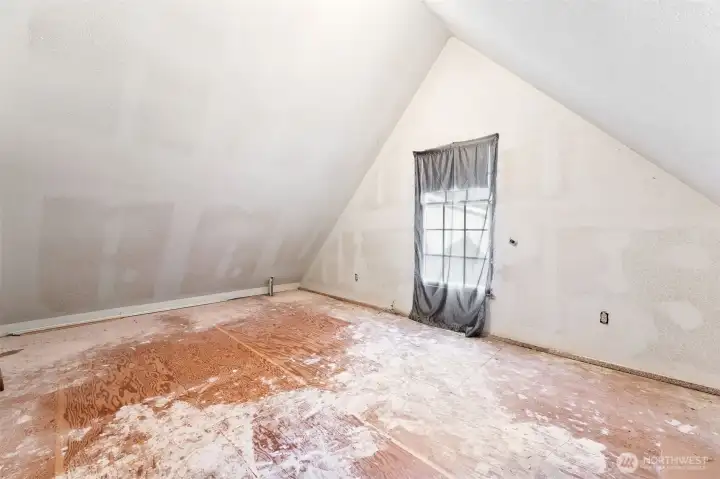 Partially finished bonus room, great for play area, music, reading or storage space.