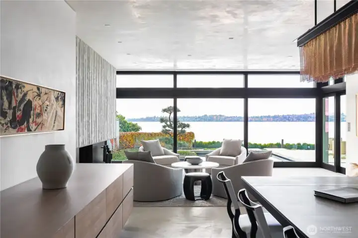 Custom cabinetry completed by local artisans. Solid nickel dining room table with seating for twelve.