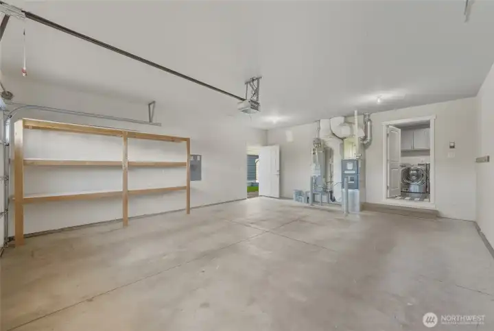 A double garage with electric door opener.